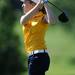 Saline's Stacy Cruze watches her ball after teeing off during golf regionals at the University of Michigan Golf Course on Thursday. Melanie Maxwell I AnnArbro.com